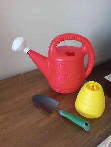 Watercan, hand spade, hornet trap