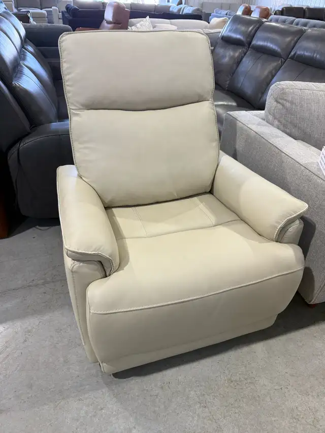 Cream leather power recliner with power headrest