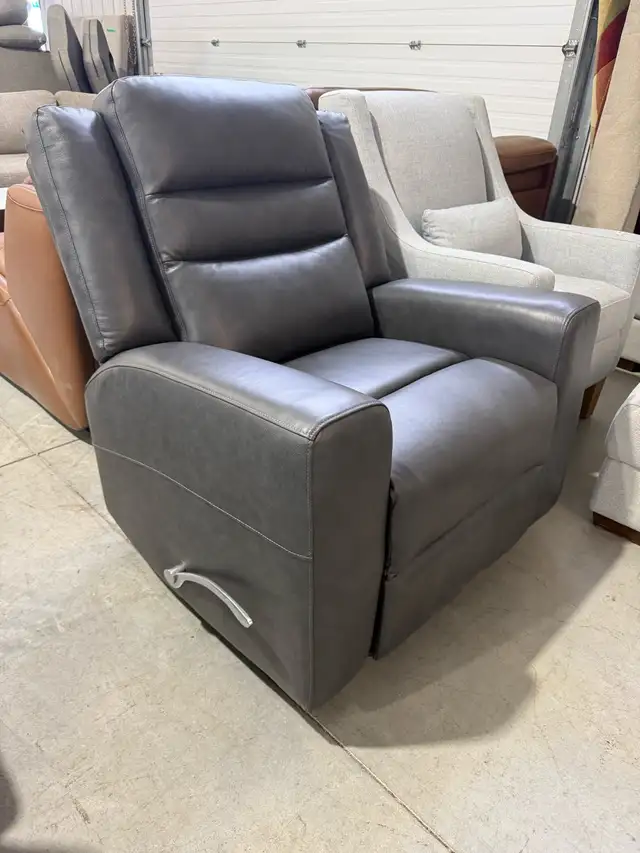 Grey leather rocker manual recliner