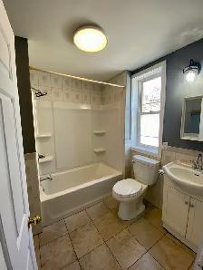 3 bed / 1 bath Apartment Uptown. (Heat & Lights Included) - Photo 4