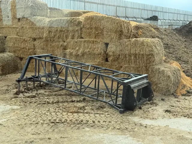 Silage rake for case loader