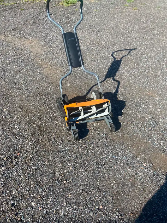 Old style push mower,brand new golf cart tire and wheel