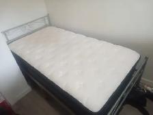Twin bed with light metal frame
