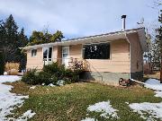 Peaceful Acreage with Heated Shop, Garage & Horse Barn
