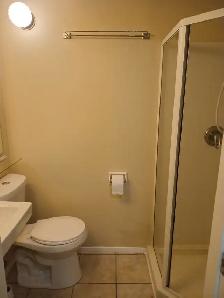 Basement bachelor apartment for rent - Photo 2
