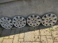 4 caps/enjoliveurs 15 pouces(195-65R15). Honda civic