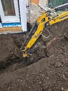 excavation and bobcat - Photo 3