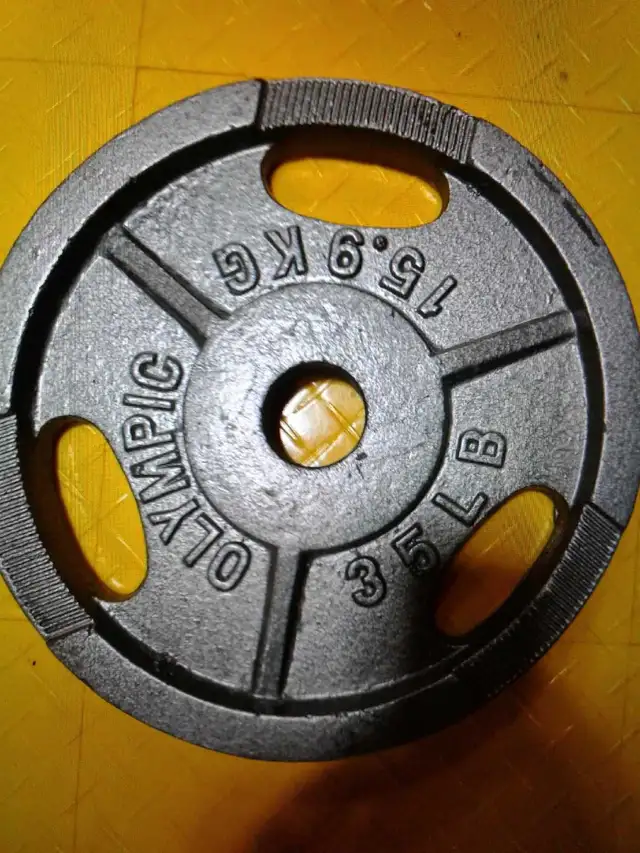 2x 35 pounds tri-grip Olympic plates - $75 or trade