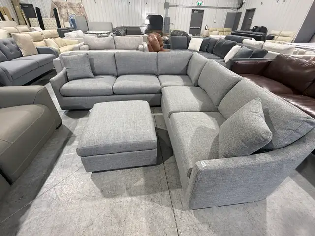 Grey fabric sectional with ottoman