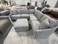 Grey fabric sectional with ottoman