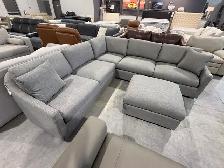 Grey fabric sectional with ottoman - Photo 2