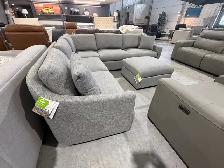 Grey fabric sectional with ottoman - Photo 3