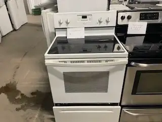 Cuisinière blanche vitrocéramique convection Whirlpool