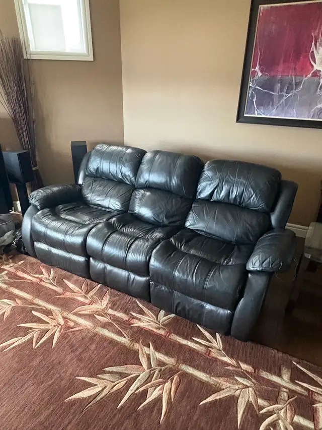 Free black leather reclining couch