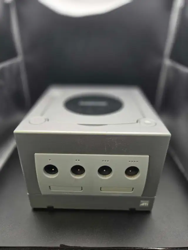 Silver Nintendo Gamecube with accessories