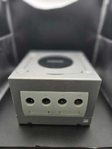 Silver Nintendo Gamecube with accessories