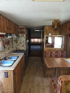 Roulotte saisonnière 27' sur terrain de camping - Photo 2