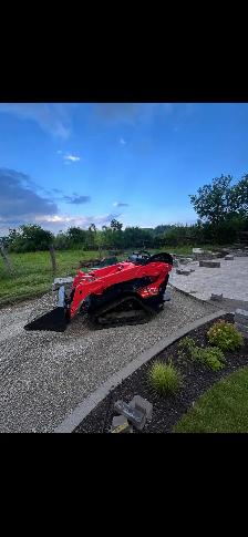 skidsteer with operator - Photo 4