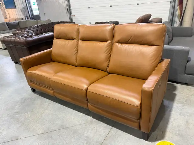 Tan leather power reclining sofa