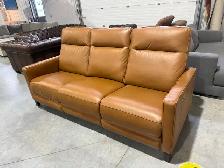 Tan leather power reclining sofa