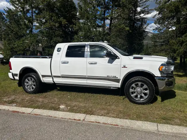LIMITED DODGE RAM WITH NEW WARANTEED 6.7L CUMMINS DIESEL ENGINE