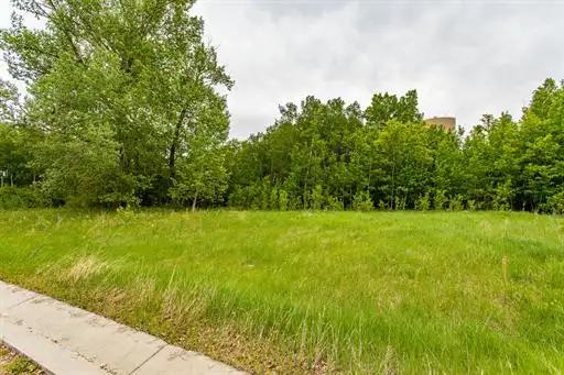 Fully serviced lot 4 in Alix – Ready for your dream home!