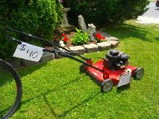 RED LAWN MOWER FOUND IN STORAGE UNIT