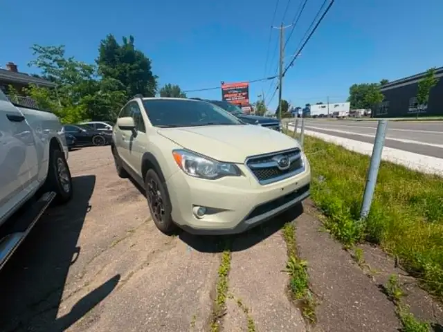 Subaru Crosstrek XV 2013 Aut. AWD. $6295. Rusty 450-820-0550