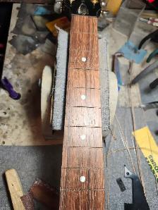 The guitar shoppe Calgary bone nut and saddle replacement - Photo 5