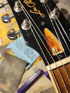 The guitar shoppe Calgary bone nut and saddle replacement - Photo 6