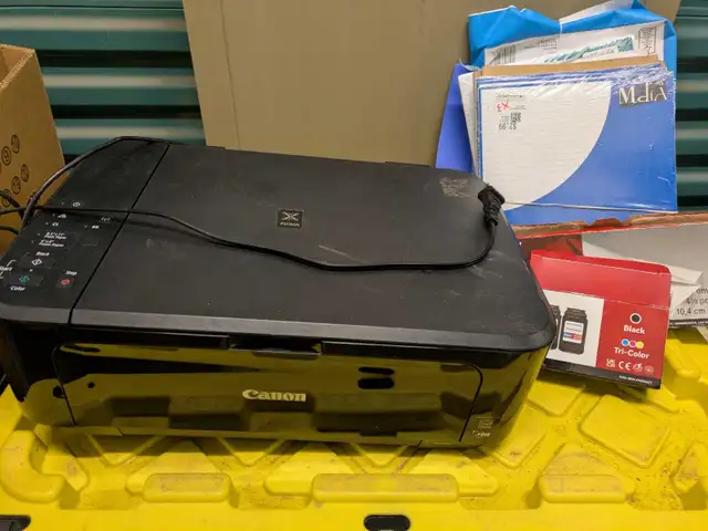 printer, extra cartridge and lots of paper
