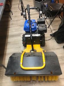 Gas powered sweeper