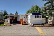 RARE OPPORTUNITY! UPDATED GREENWOOD MOBILE HOME FOR $76,347
