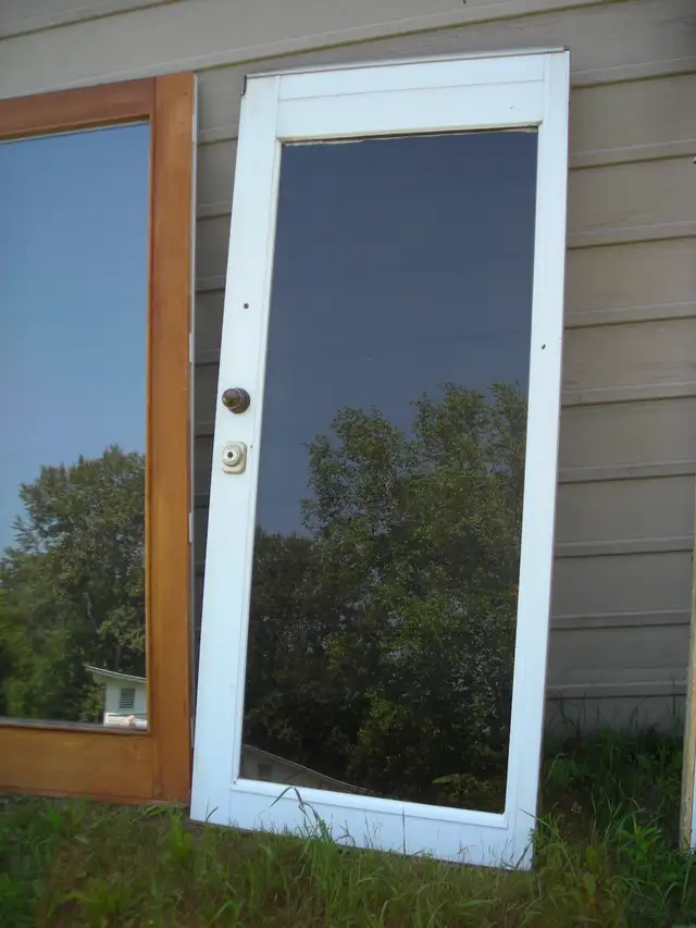 Portes jardin usagées mais solides
