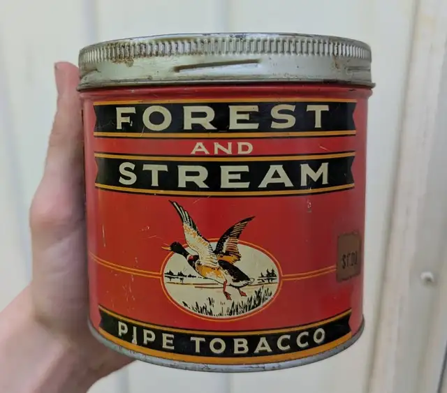 VINTAGE 1940's FOREST AND STREAM PIPE TOBACCO TIN (HALF LB.)
