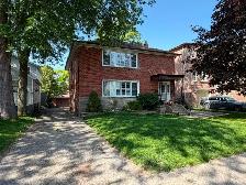 Beautifully renovated detached triplex on a large 50 x 120ft lot