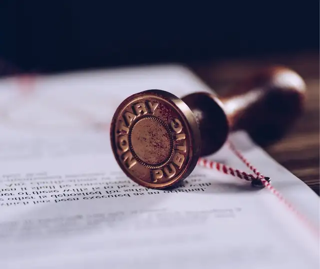 Notary Public and Commissioner for taking Oaths