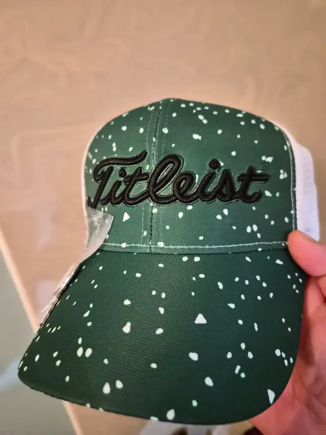 Brand new never worn titleist hat with ball marker for sale!