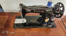 Antique Singer Sewing machine and cabinet