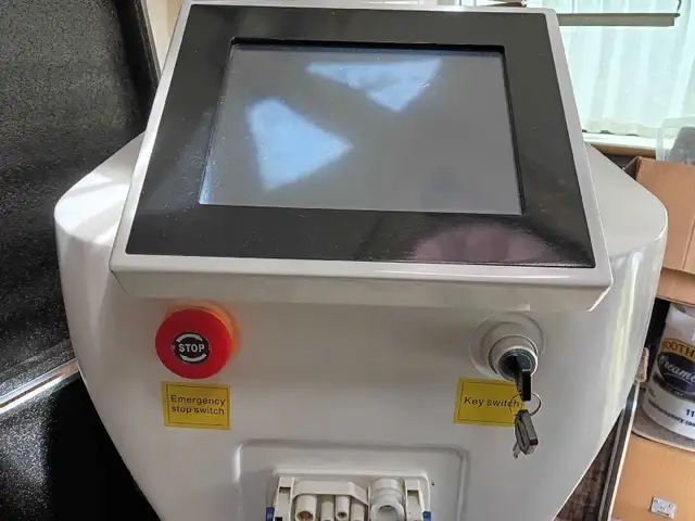 Tattoo removal machine