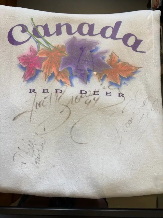 multi figure skaters signed sweatshirt