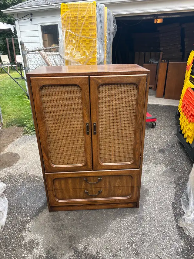 Free delivery used Vintage Wood Armoire with Cane Doors