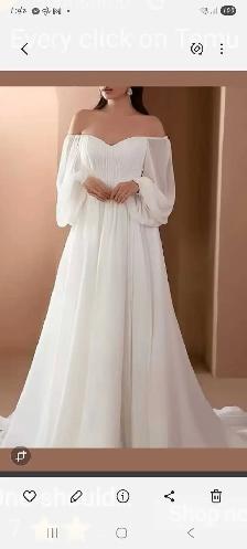 Never worn wedding dress for sale.