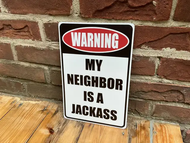 Tin "WARNING MY NEIGHBOR IS A JACKASS" Sign !