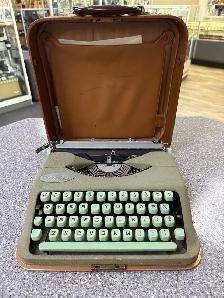 Hermes Rocket TypeWriter with case Circa 1957