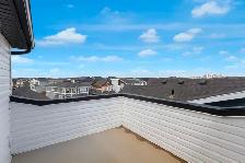 Mountain views, turnkey, full landscaping, developed basement - Photo 4