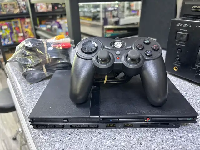 PS2 Slim system with aftermarket controller