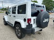 2015 Jeep WRANGLER UNLIMITED 4WD 4dr Sahara - Photo 7