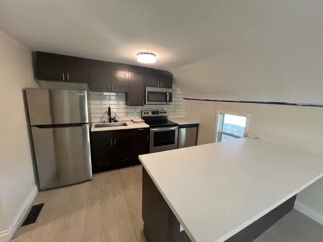 1 Bed   Den, 1 Bath, with 1 Car Parking