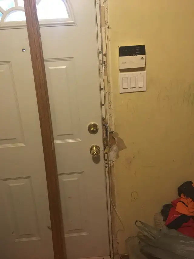 BUSTED DOOR IS NOT CLOSING EASY, dead bolt is stuck. CONTACT US